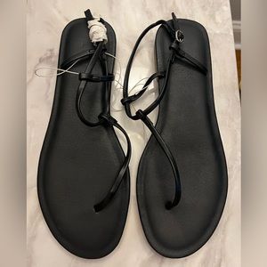 Black T-strap sandals